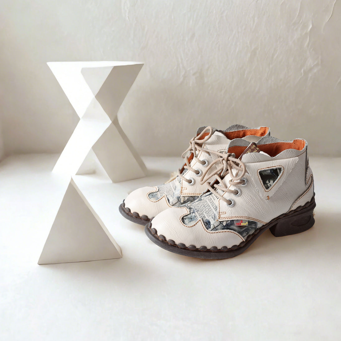 Embrace Year-Round Style with TMA EYES Retro Newspaper-Print Boots